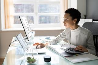 businessperson looking at paperwork in an office