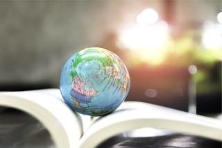 small glob on top of reference book
