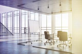 White and glass conference room corner toned