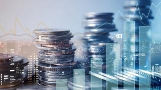 Financial savings overlay on cityscape