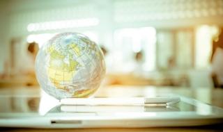 globe with tablet pen