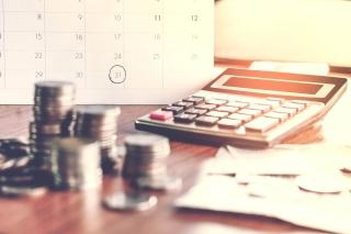 Calculator and money on desk