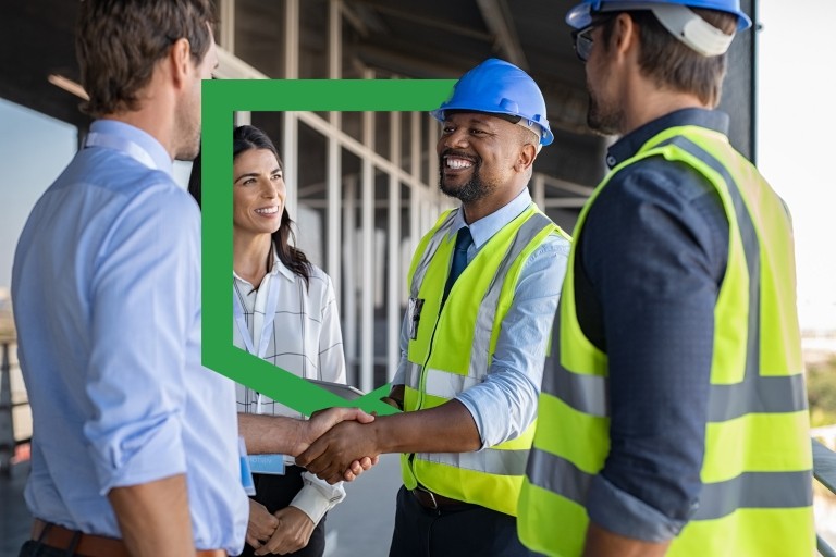 construction shaking hand with shield