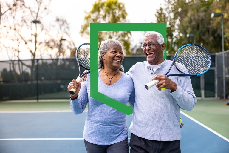 elderly playing tennis with shield