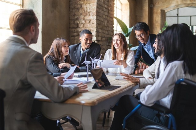 Group of businesspeople discussing about financial strategy, renewable power, sustainable innovation project and environmental economical issues