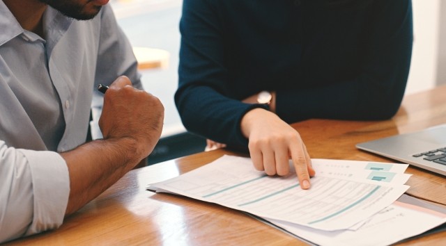 two people meeting about insurance policy