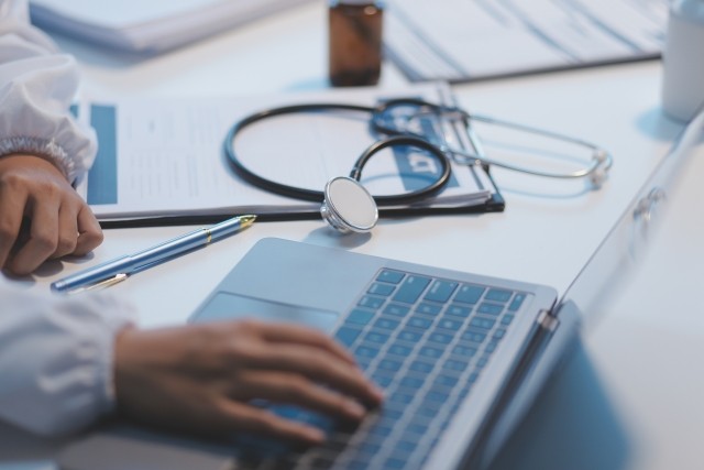 Healthcare, doctor with a laptop
