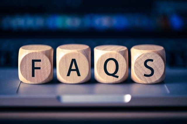 Blogs on a computer keyboard spelling "FAQs"