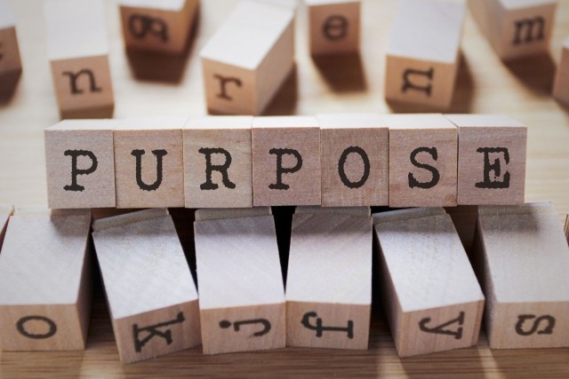 Wood blocks spelling out "purpose"