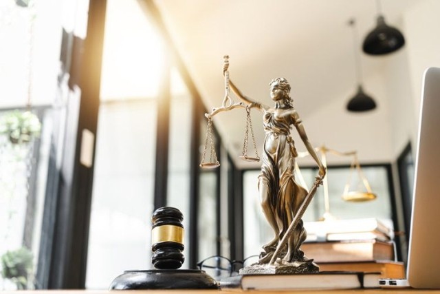 Statue of justice on tabletop of legal office