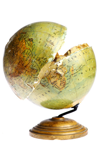 An image of a broken in half globe figure.