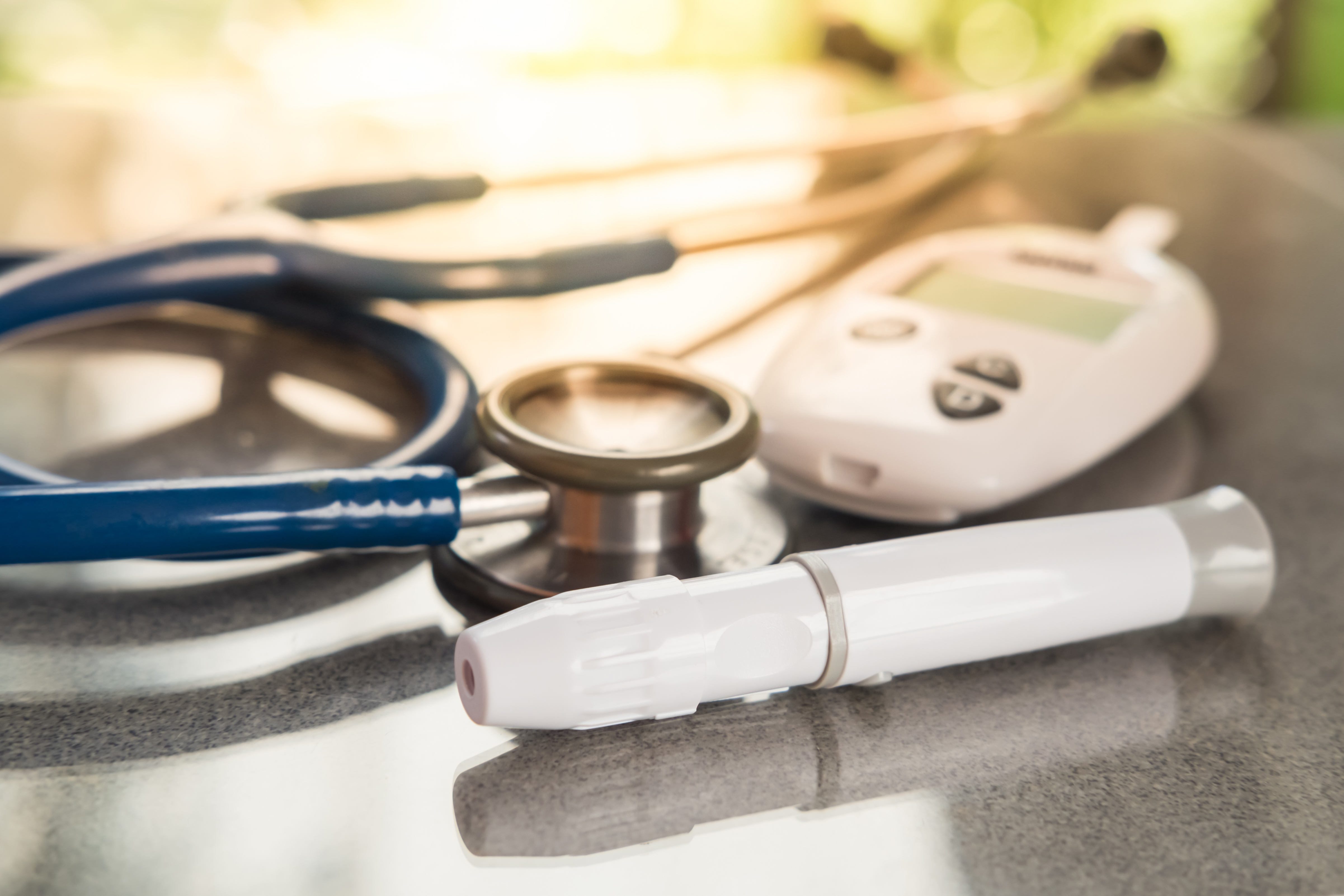 Stethoscope and diabetes blood glucose meter