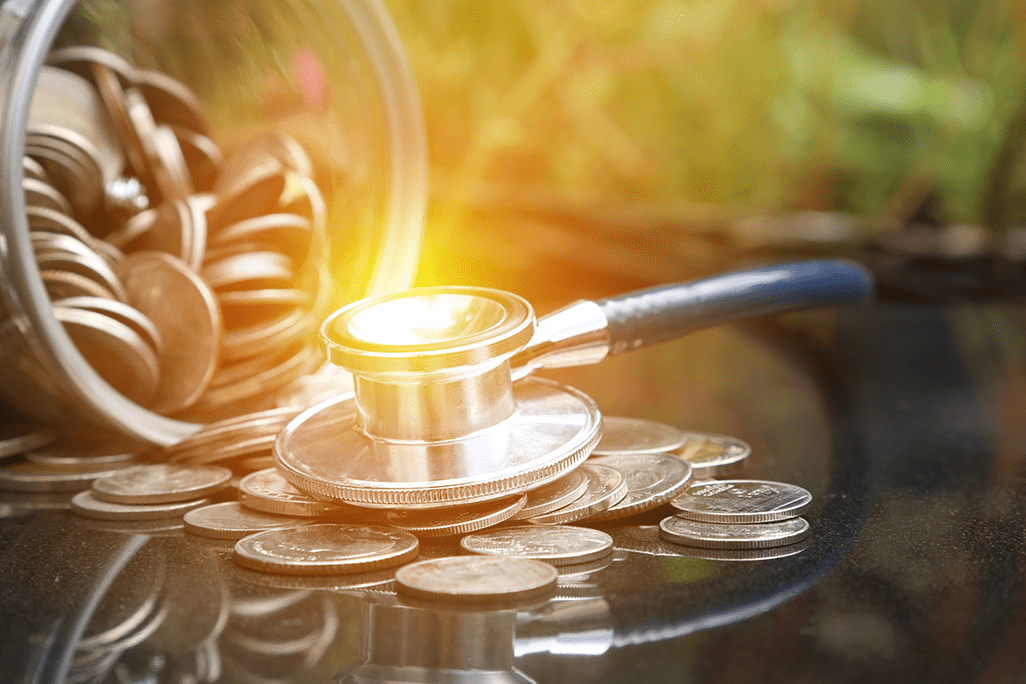 stethoscope money coins savings