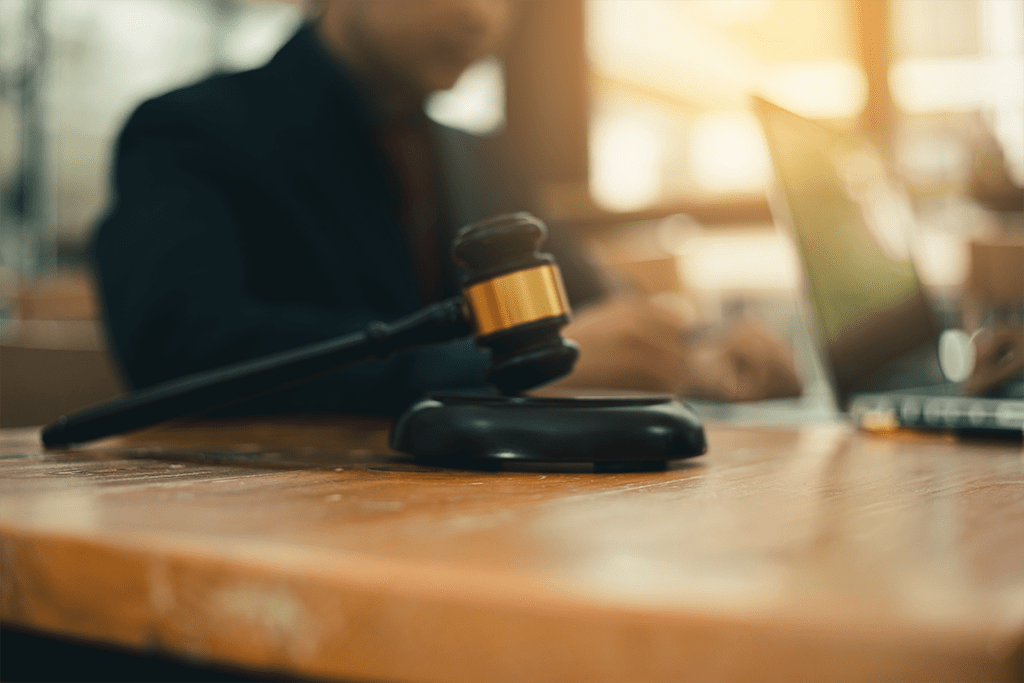 image of a gavel on desk with blurred background