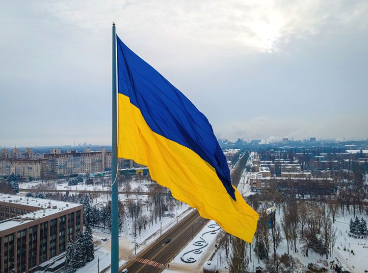 Ukranian flag over city snow