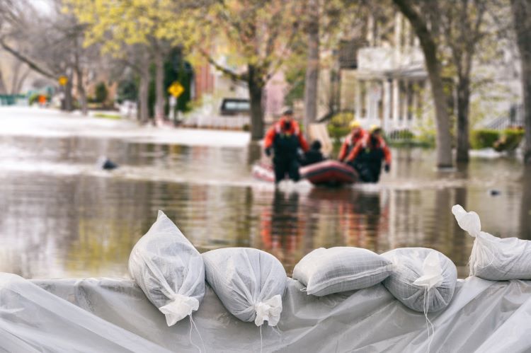 Post-flood with sandbags and rescue